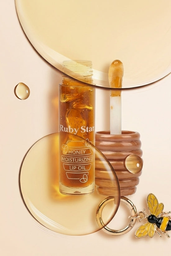 Óleo labial Ruby Star com mel e vitamina E em embalagem inspirada no mel